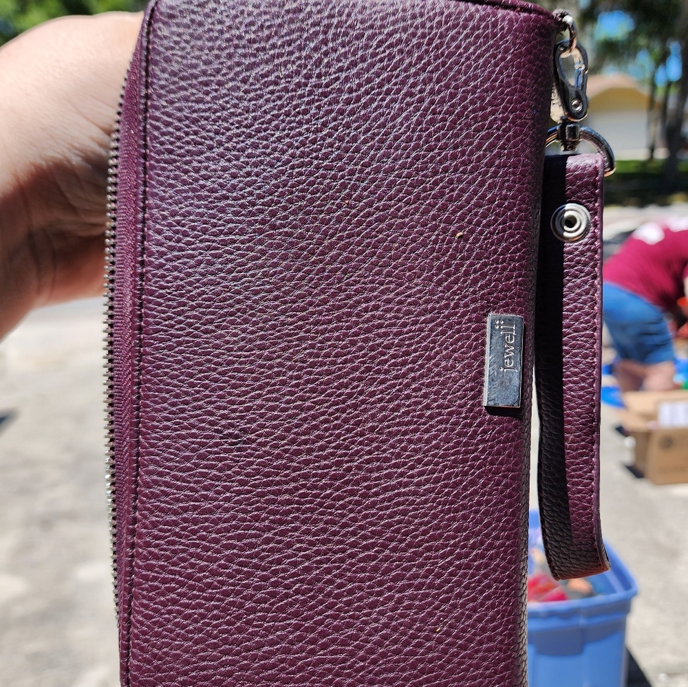 Al about the Benjamin's wallet purple